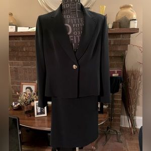 Two piece navy blue Tahari woman’s suit